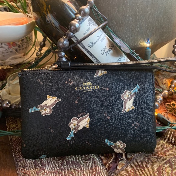 Coach Handbags - Authentic COACH Signature Coated leather penguin print  zip top wristlet